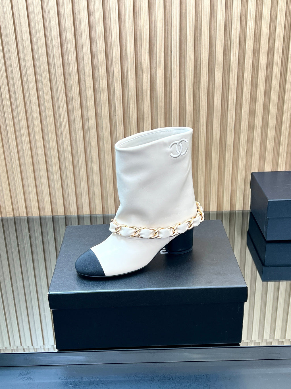 CHANEL 25S LOW BOOTS 65MM IN WHITE CALFSKIN GOLD HARDWARE