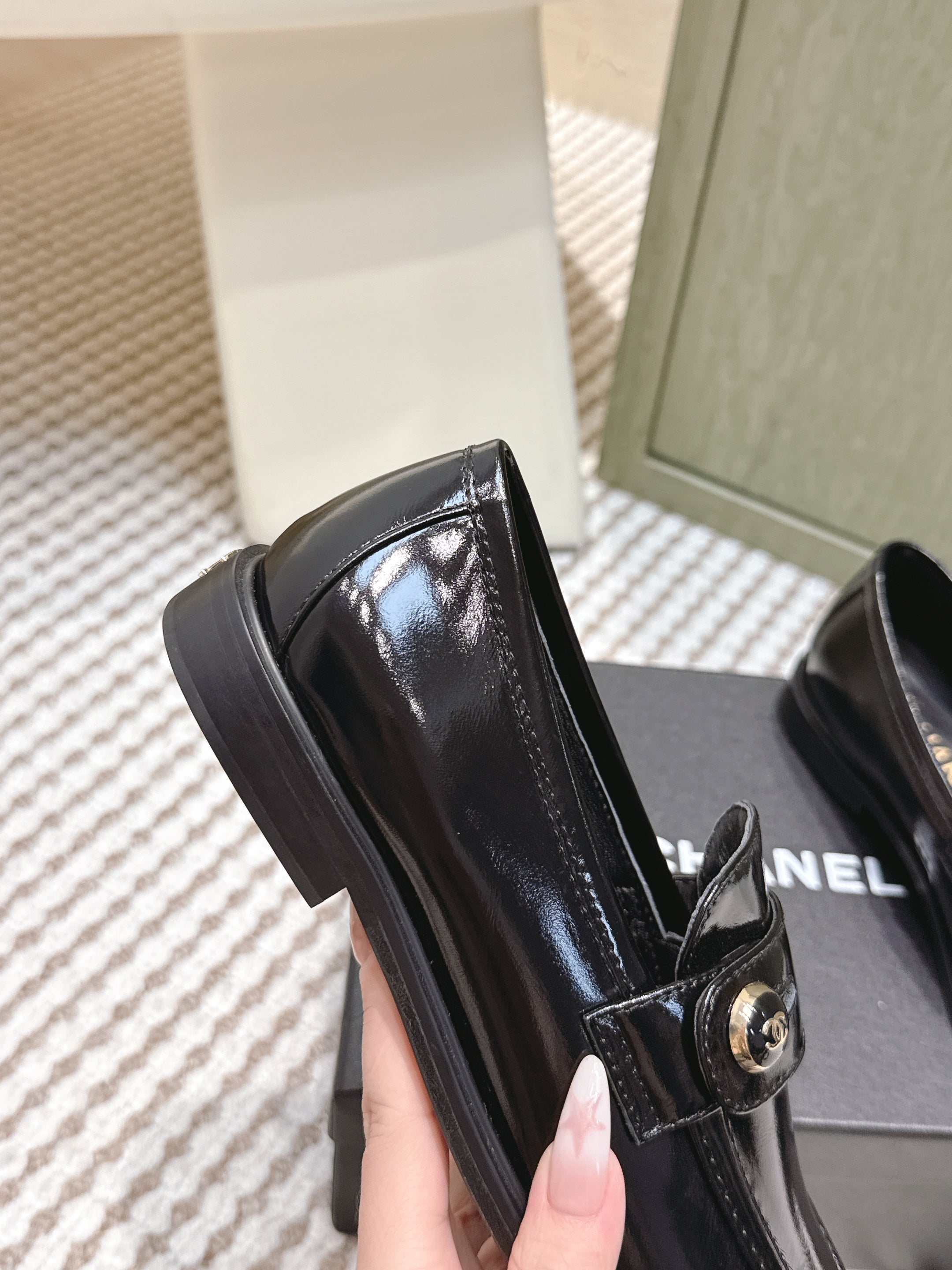 CHANEL 25S GODDESS FLAT LOAFERS IN BLACK PATENT CALFSKIN GOLD HARDWARE