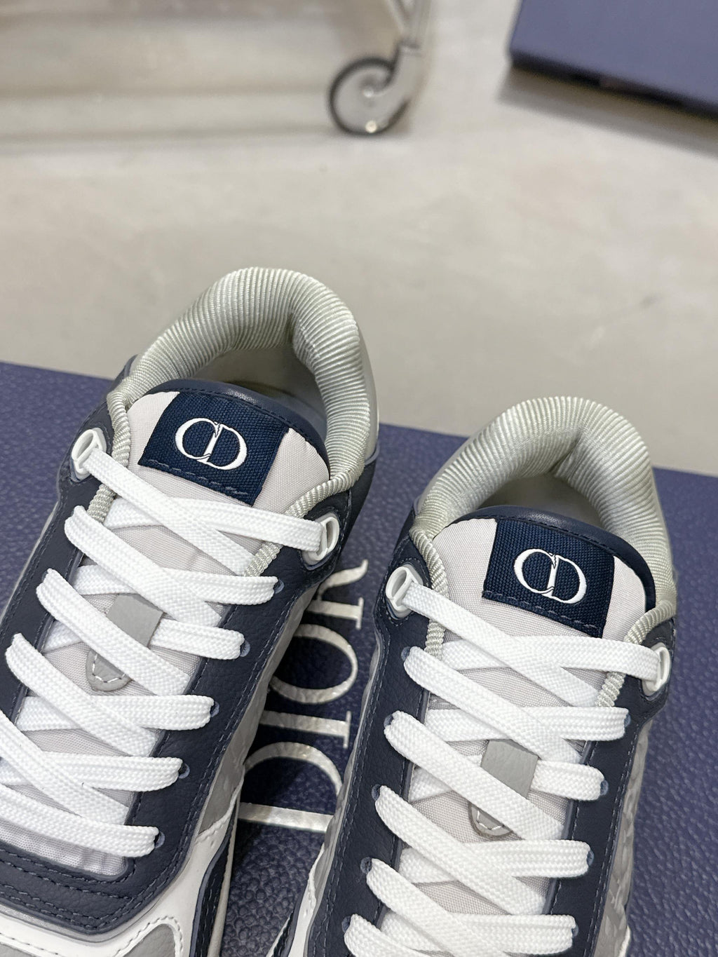 DIOR 25S B27 UPTOWN LOW-TOP SNEAKERS IN DARK BLUE MIX GREY CALFSKIN STYLE 2